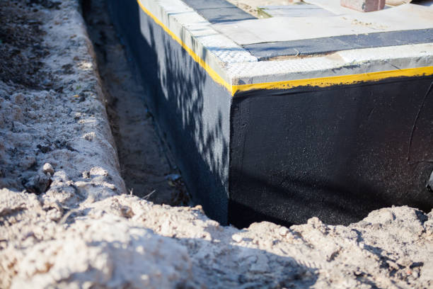 Professional Emergency Waterproofing technician working in Midland Park, NJ